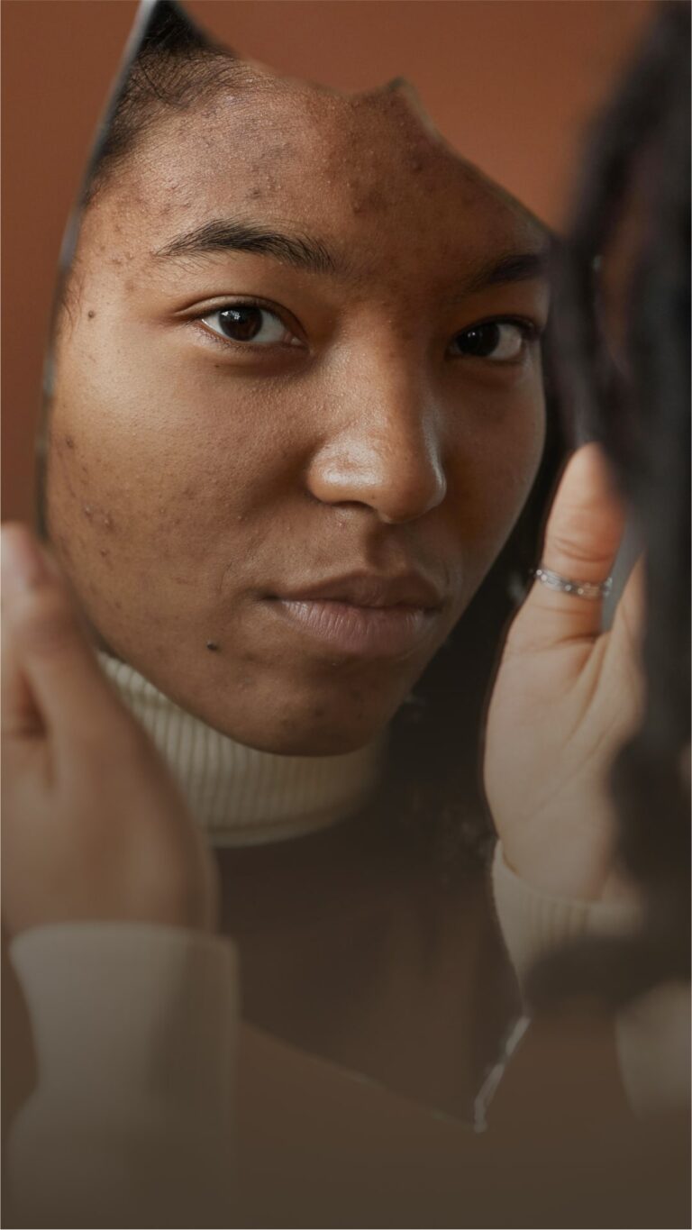 african american woman looking in a mirror